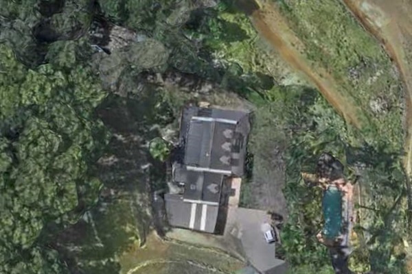 The dam is at the bottom of this picture, next to the main house. The caretakers cottage is the blue dot. 