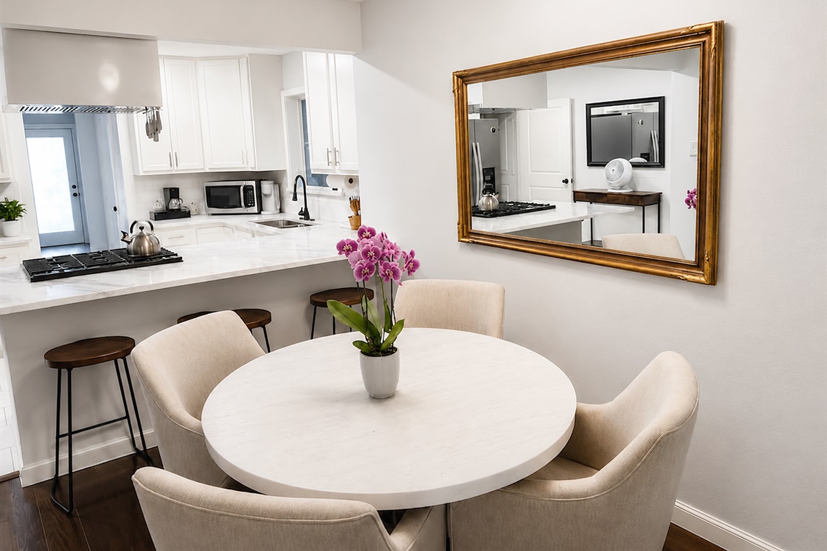 Bright dining area just off the kitchen — perfect for morning coffee, meals, or gathering with friends and family