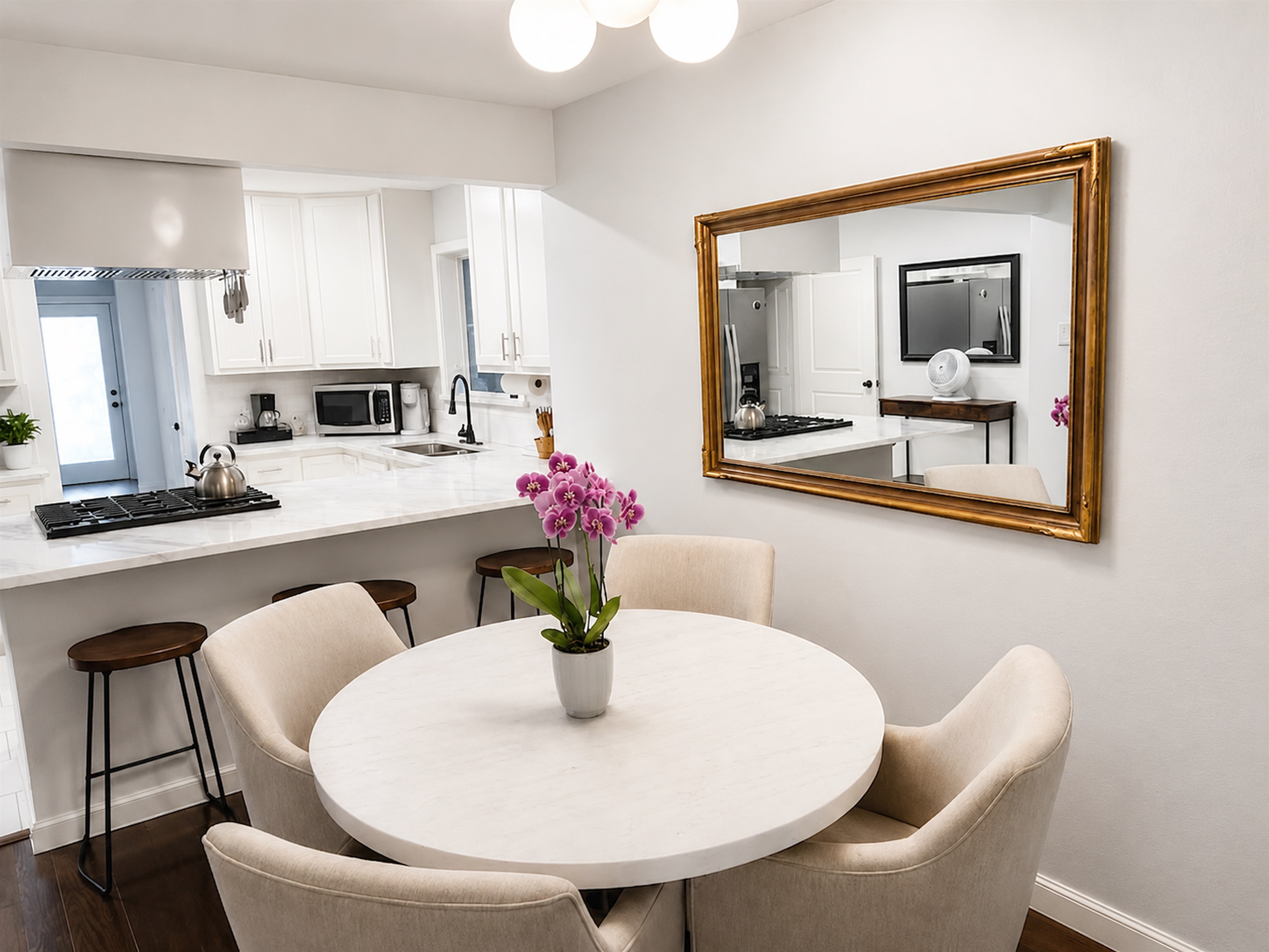 Bright dining area just off the kitchen — perfect for morning coffee, meals, or gathering with friends and family