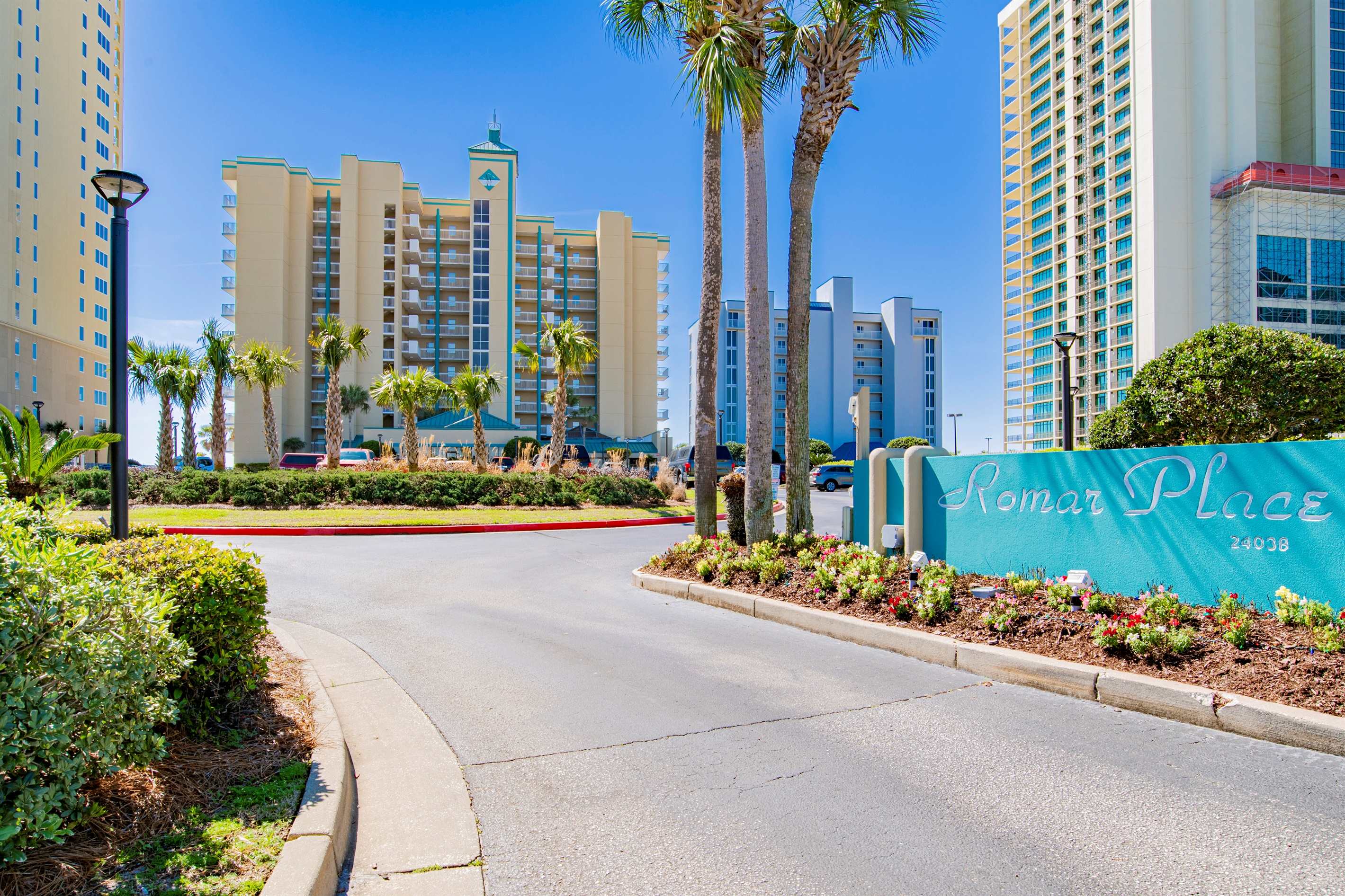 Look for this entrance, next to the traffic light and across from Wolf Bay Seafood!