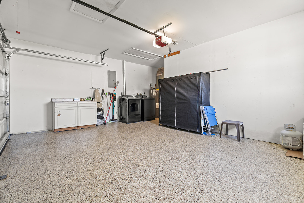 🚗 The spacious garage offers convenient parking, storage, and easy access during your stay.