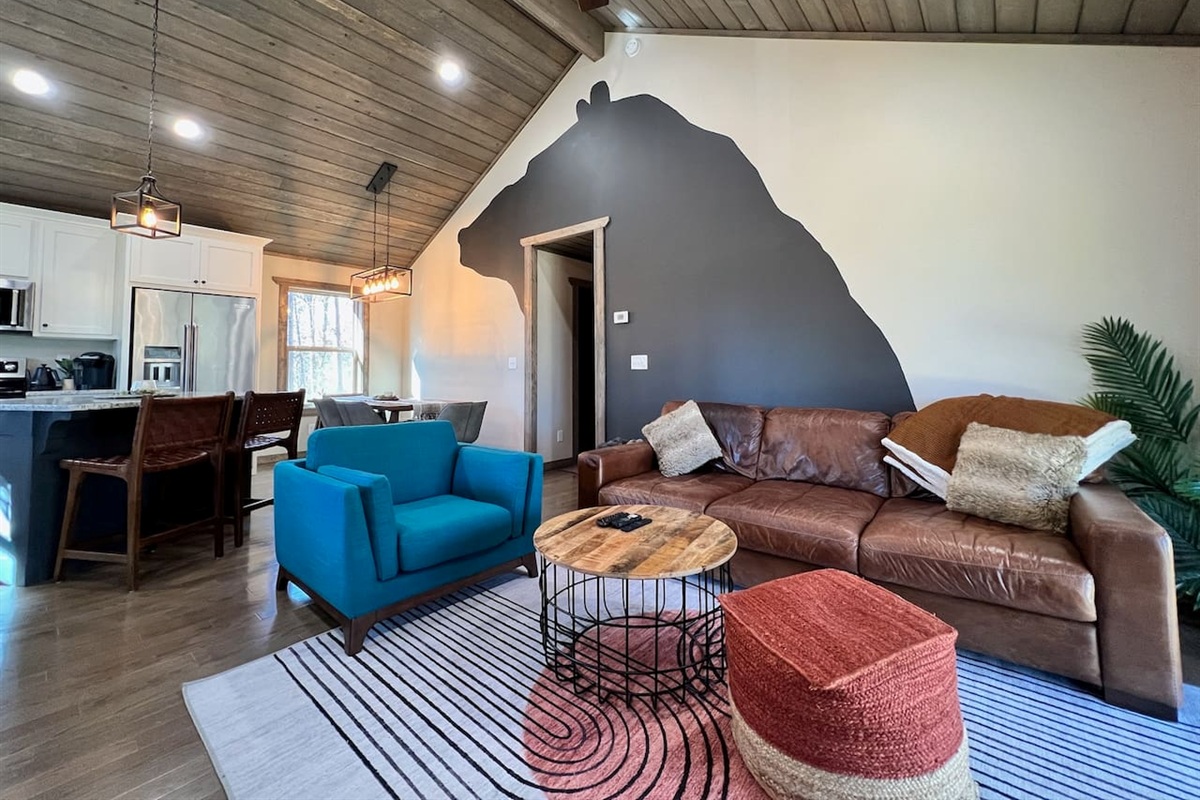 Comfy living room with gas fireplace and Samsung Smart TV stream your favorites.