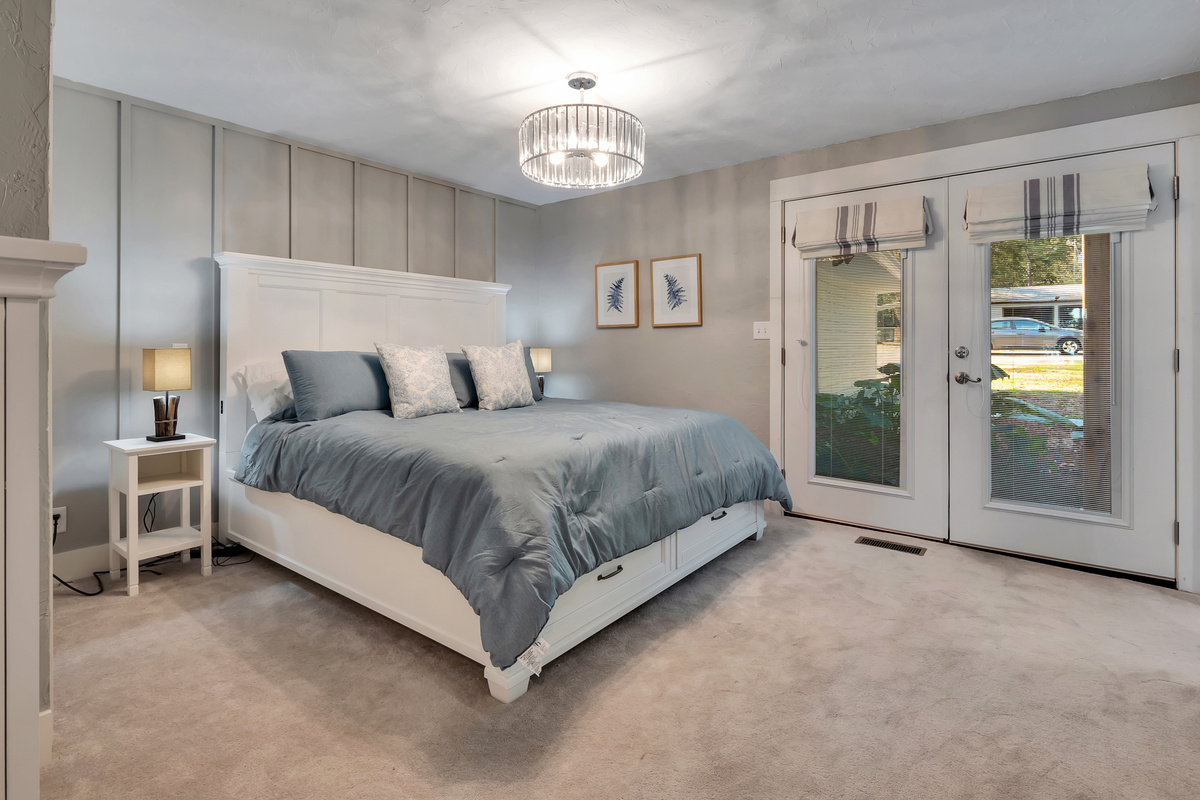 Main floor, master, king bed, tv, front porch access, en-suite bathroom