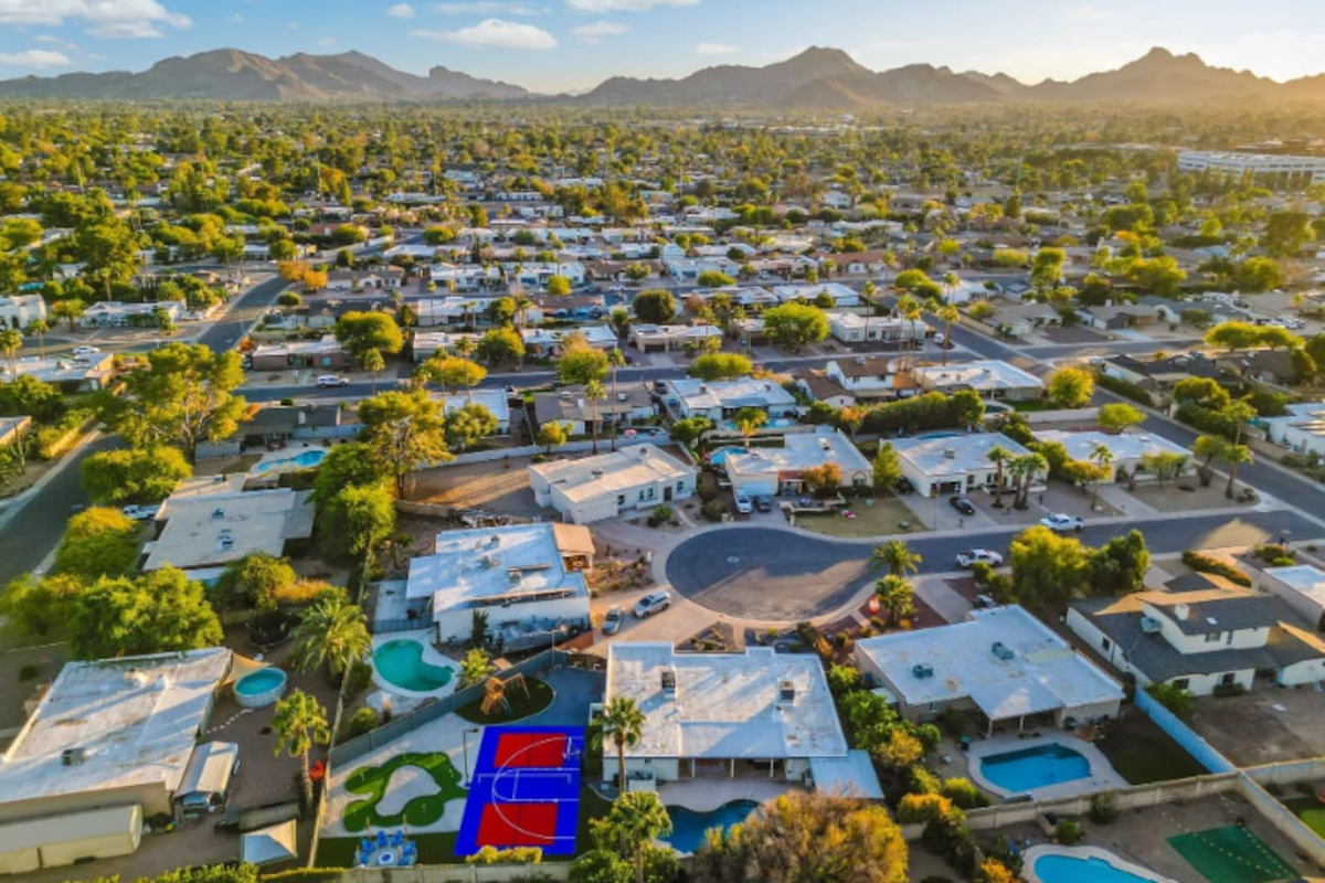 Mountains in the distance, palm-lined streets below — this is the kind of setting that makes the whole trip feel like a getaway.