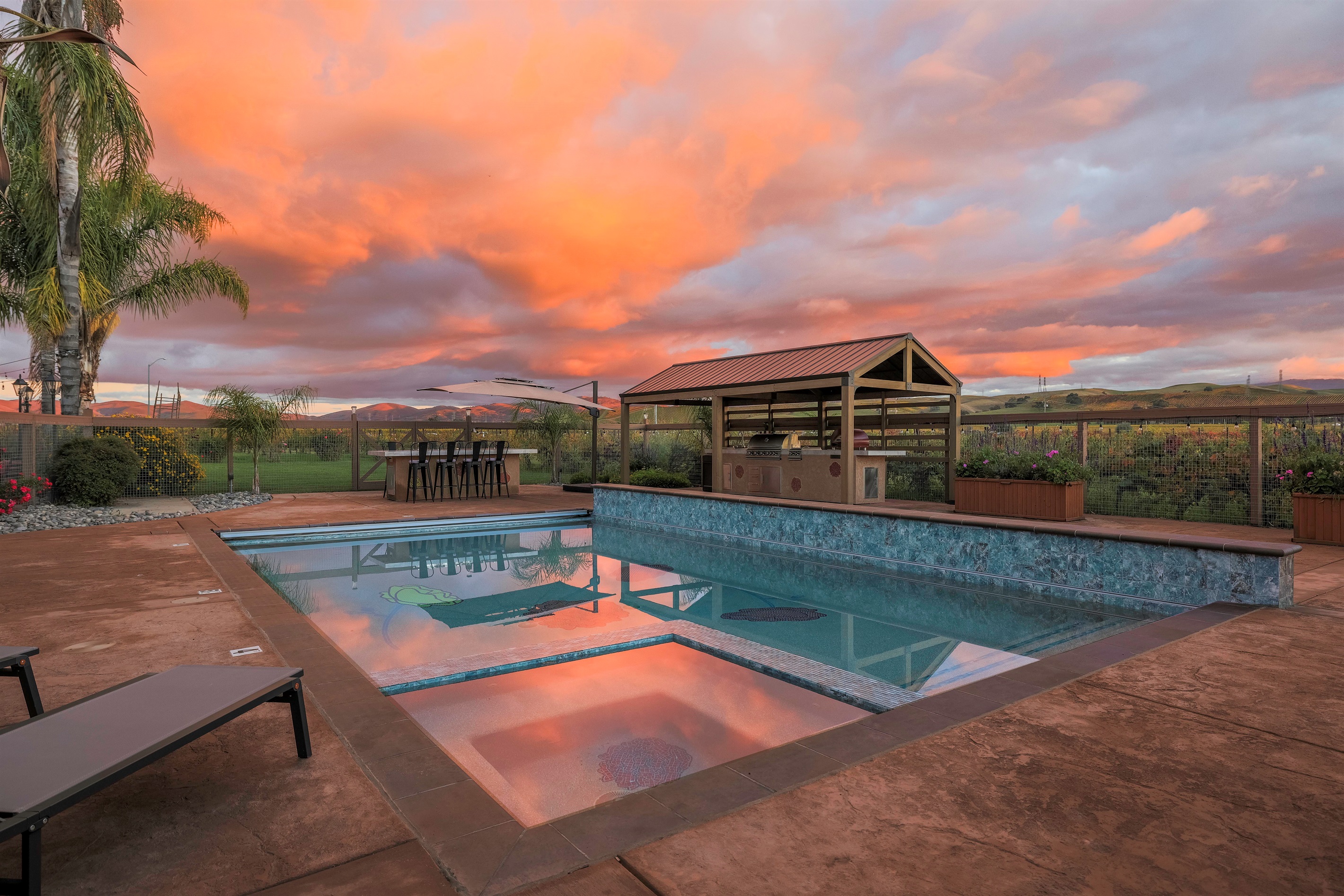 Our new pool and hot tub at sunset on the vineyard.
