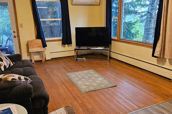 Roku smart TV, couch, recliner, and access to 3 season porch