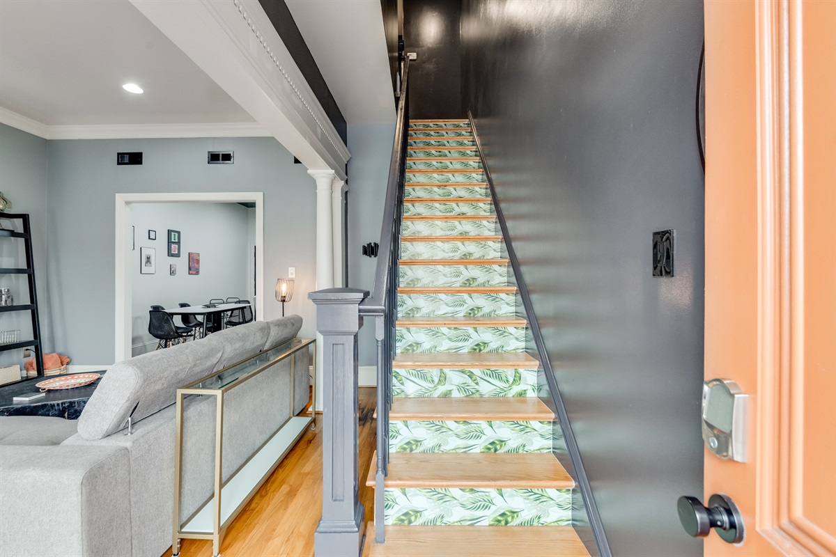 Stunning staircase: Climb to new adventures with vibrant leaf-patterned steps!