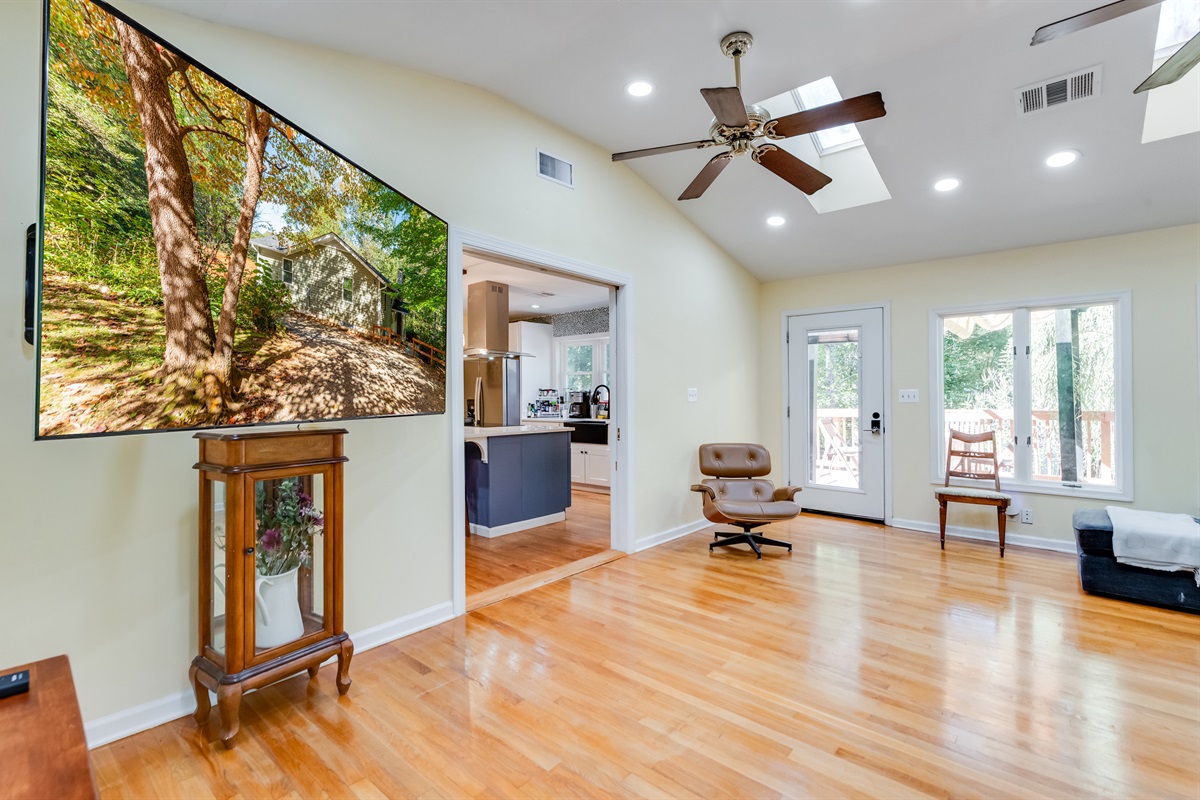 Living Room: Bright and airy space with sleek furnishings and a captivating view of nature!