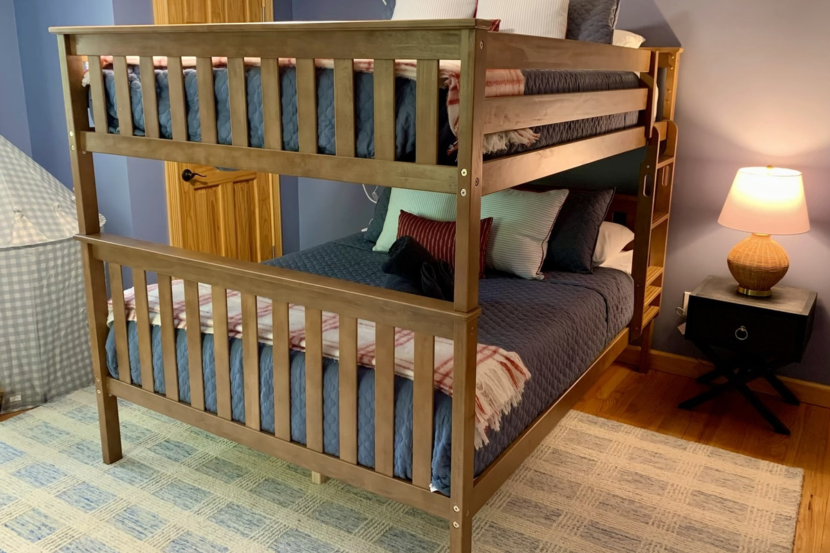 Rare queen-over-queen bunk beds provide generous sleeping space for kids, teens, and adults alike.