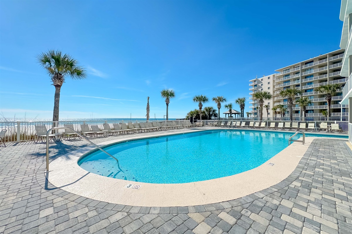 Private pool and direct beach access offer the ultimate coastal lifestyle.  Experience resort-style living at its finest.