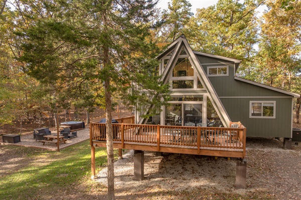 Wrap around deck overlooking our fire pit and hot tub area
