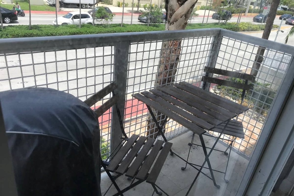 Balcony with water view and BBQ