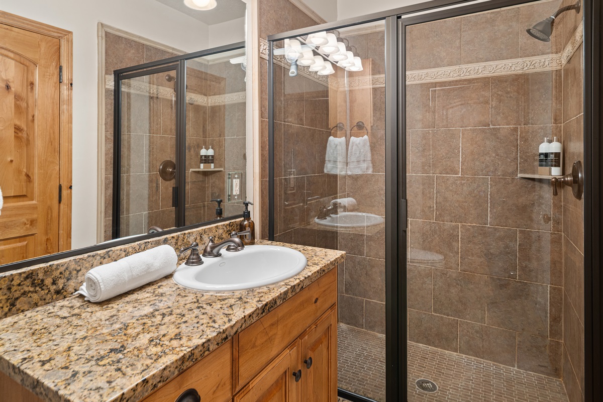 Ensuite bathroom with double vanity and walk-in shower