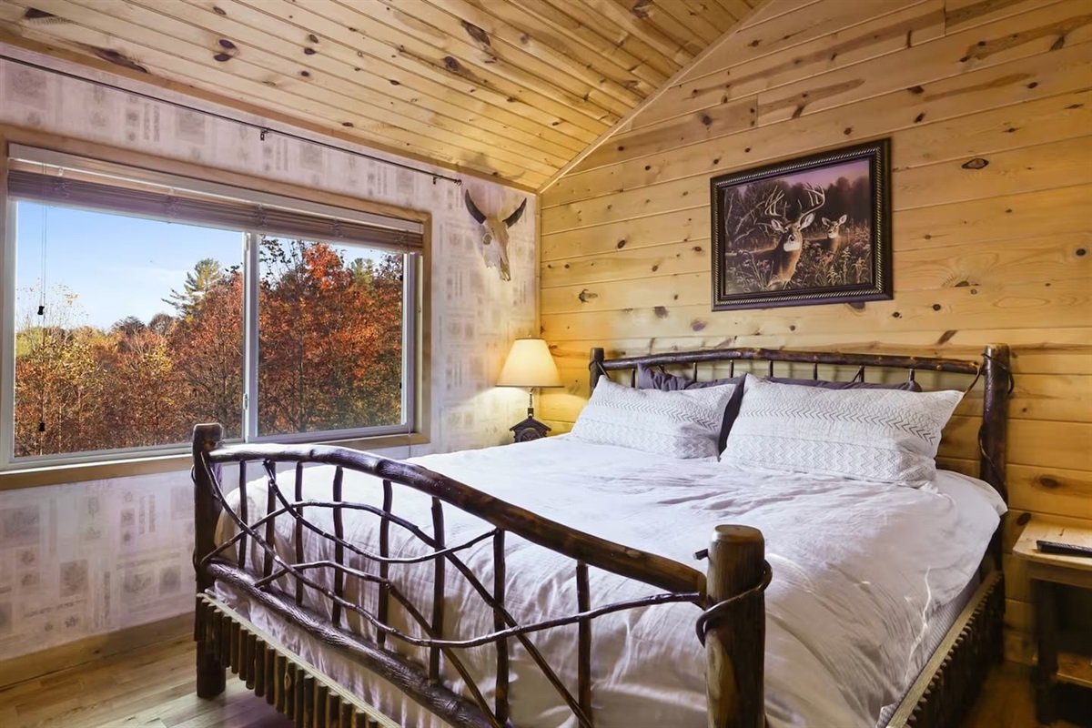 Bedroom #3 with king bed and full over full bunk bed