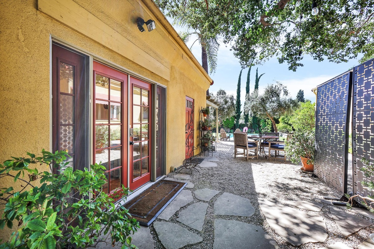 Privately screened, from the main house, the guesthouse shares the yard and pool. We try to give our guests privacy and space when you are here, but you may see us come and go in the yard.