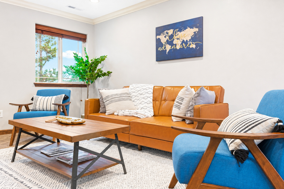 Sink into cozy relaxation on the sofa while enjoying your favorite shows on the expansive 65-inch smart TV with Netflix and Samsung TV.