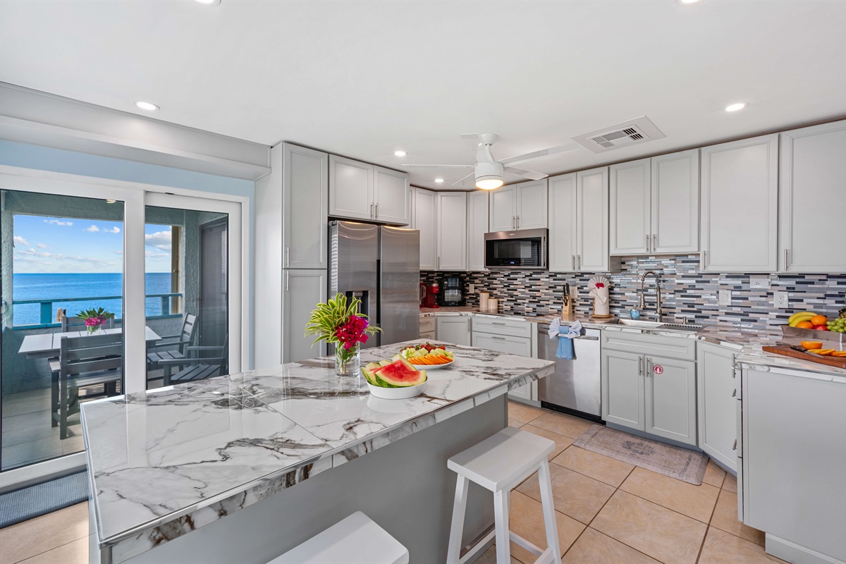 Open plan kitchen with views from every window