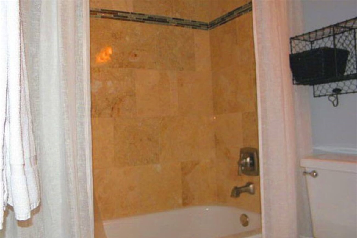Beautifully tiled shower in the Master bathroom.
