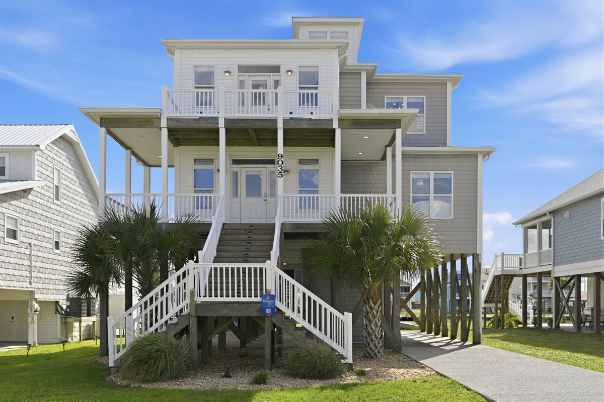 A spacious coastal home with multiple decks, covered parking, and plenty of room for the whole group