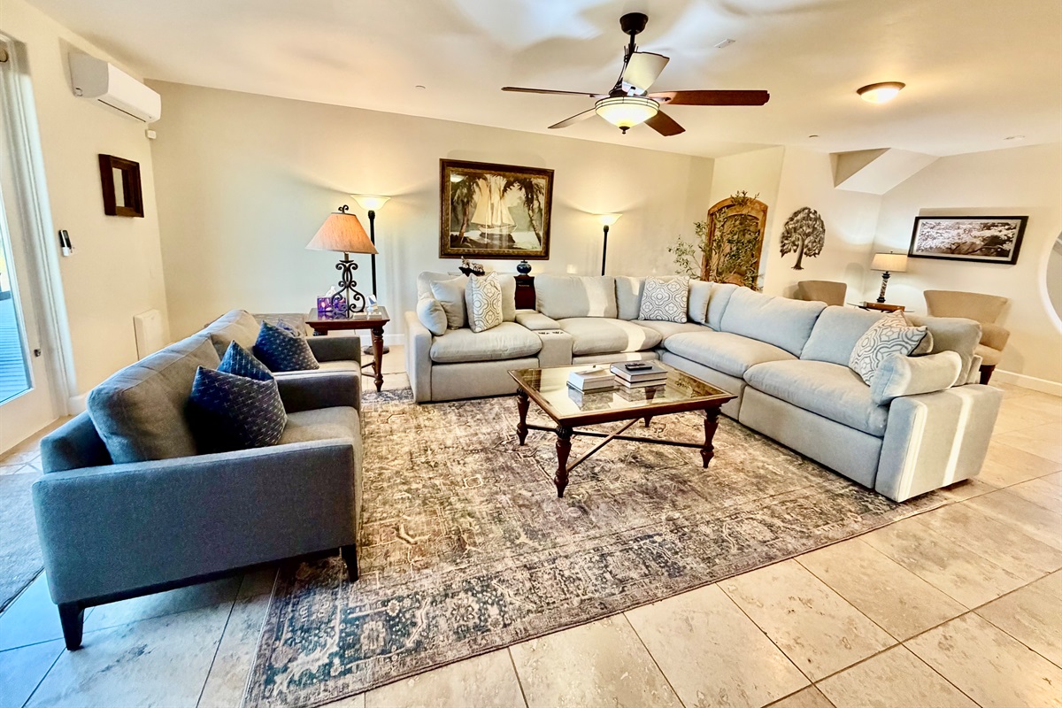 Elegant living space with plenty of seating for your stay.