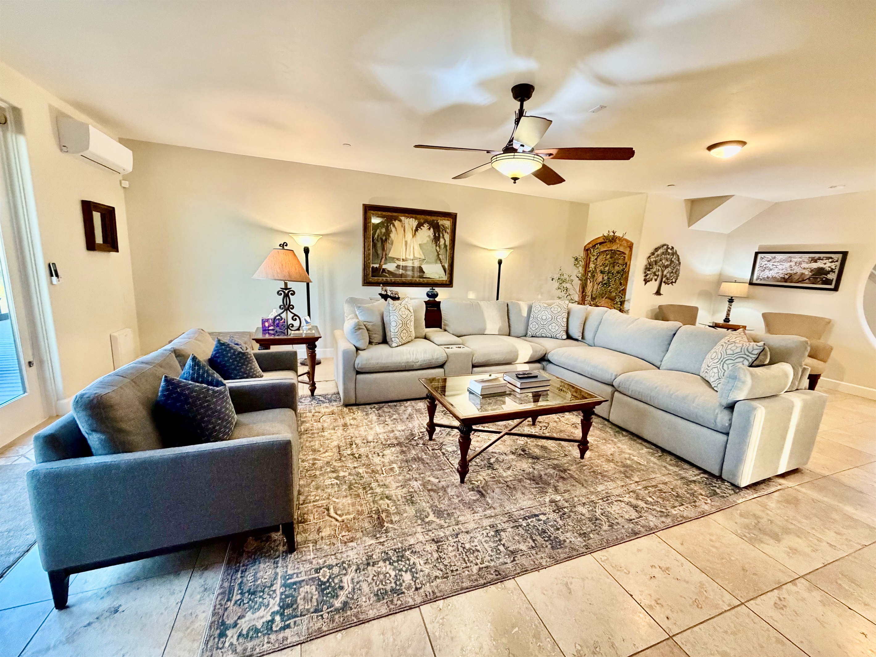 Elegant living space with plenty of seating for your stay.