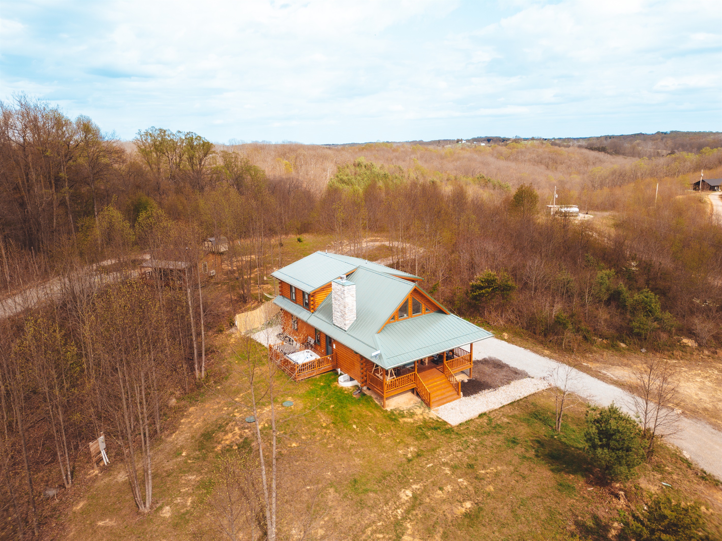 On 5 private acres surrounded by woods