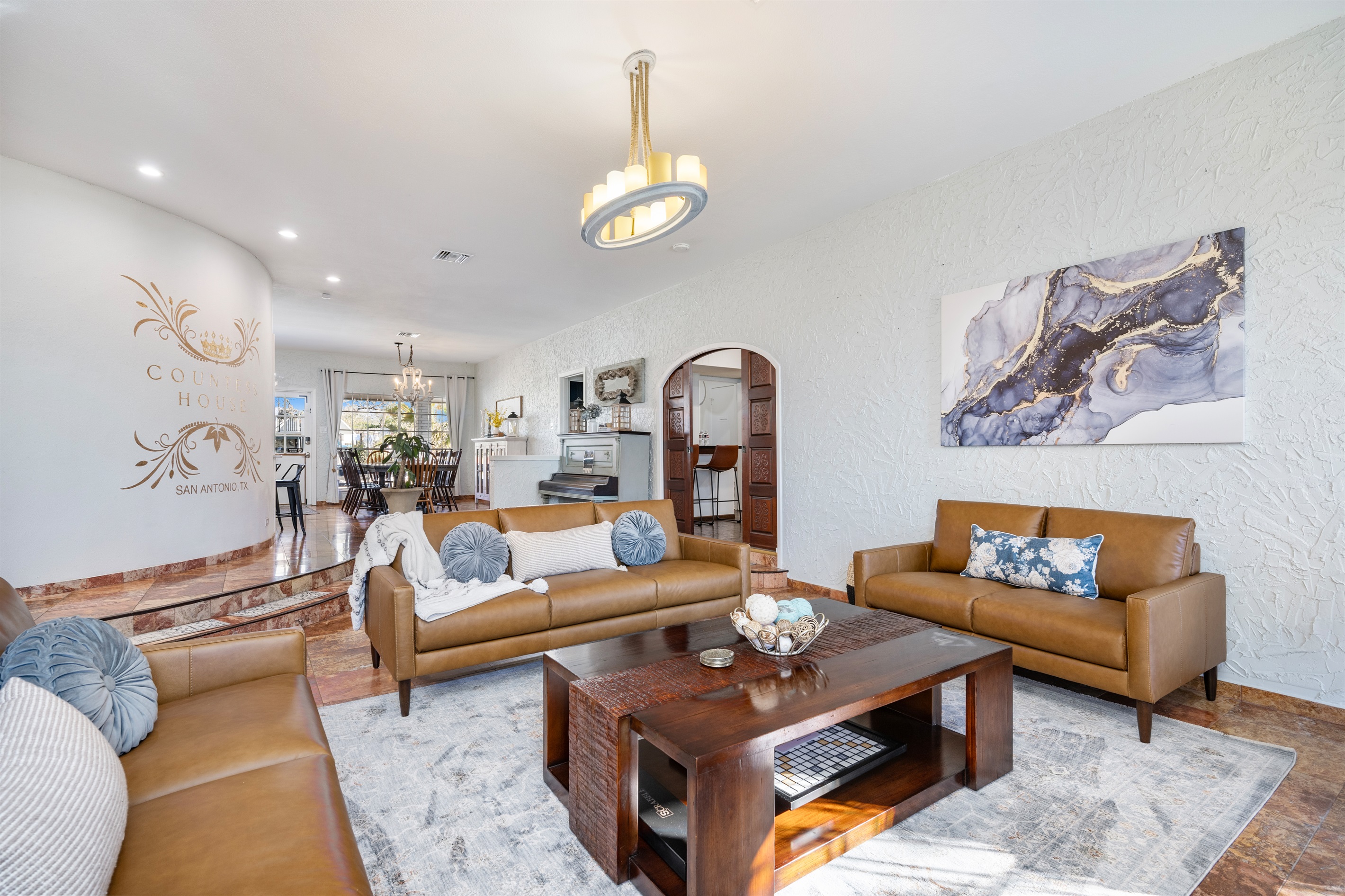 Welcome to the Countess House main living room with open concept flow for great family gatherings where everyone can enjoy what they love while being together. 