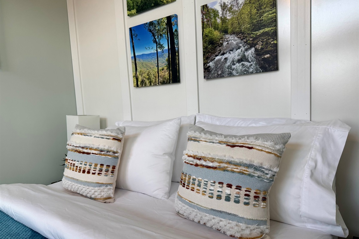 Plush pillows, luxe linens, and a memory foam mattress designed for deep sleep. After a day of adventure, sink in and recharge in total comfort with peaceful mountain views just beyond the window.