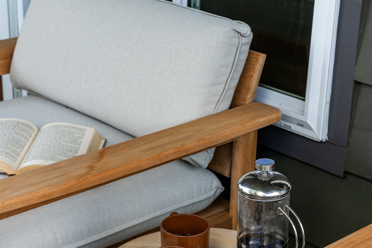 This private balcony seating for two is the perfect spot to start the day, whether with morning coffee, fresh air, or quiet conversation.