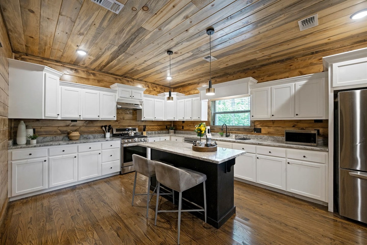 Fully stocked kitchen with everything you need to cook, dine, and enjoy family meals together.