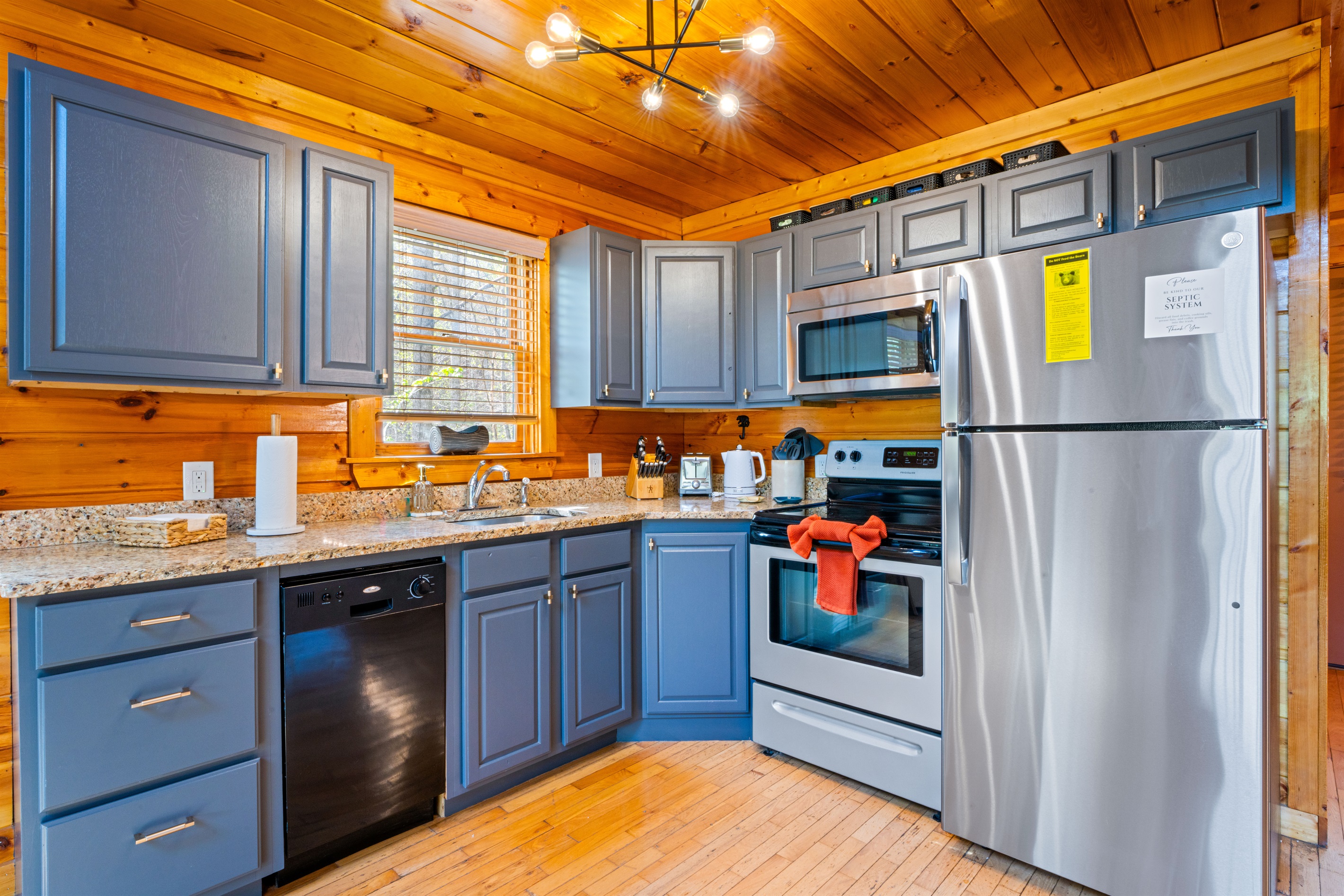 Stocked kitchen with newly upgraded refrigerator 