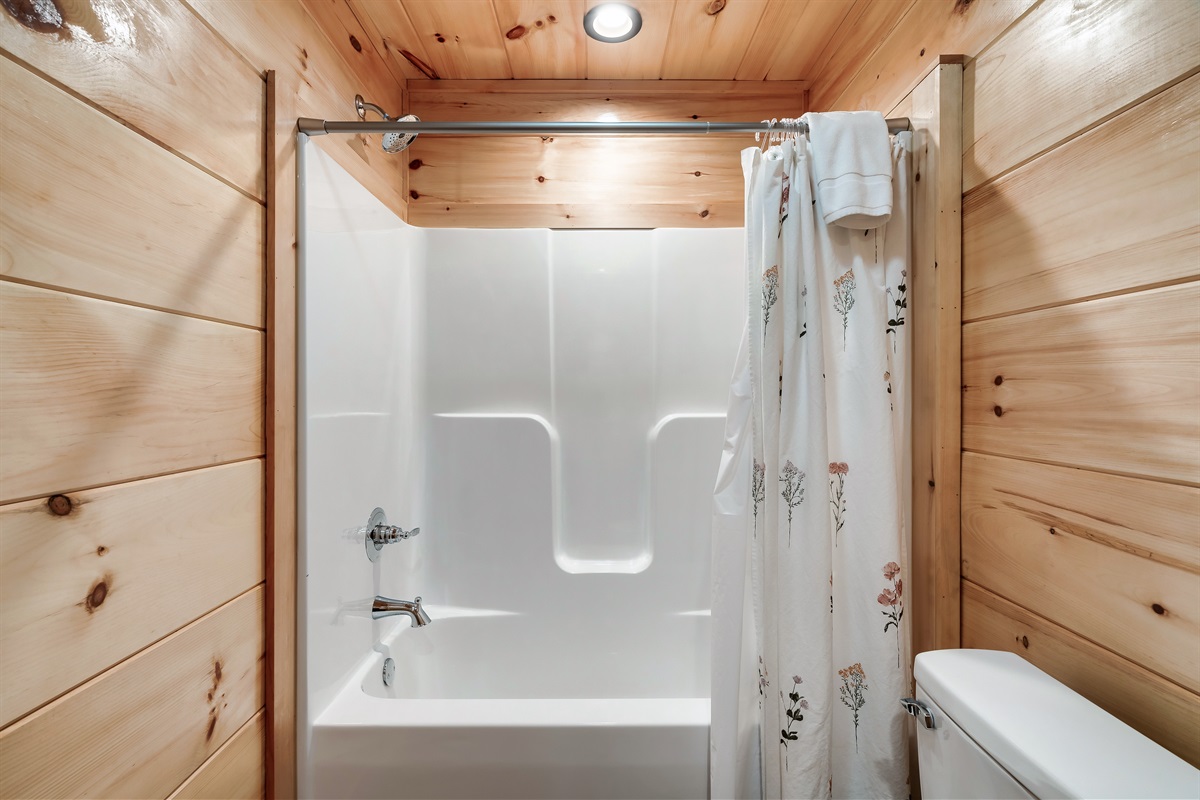 Bathroom with starter supplies and towels. 