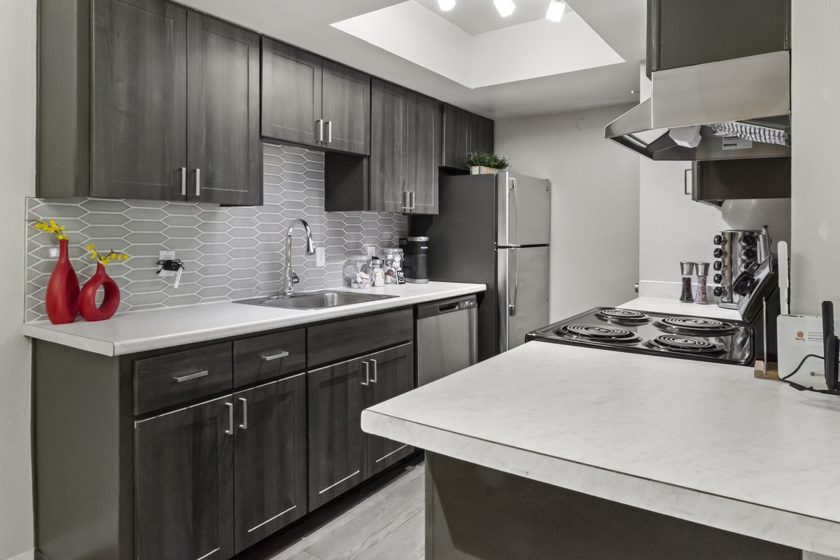  Complete kitchen setup with essential appliances, ideal for guests who enjoy cooking during their stay.