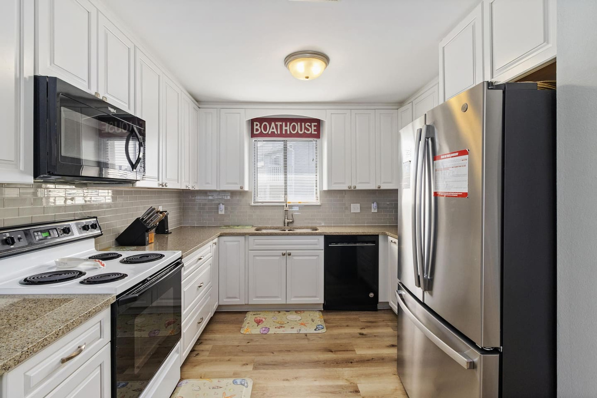 Cook for your whole crew in the fully equipped kitchen &mdash; stainless appliances, coffee two ways, and counter space to spare.