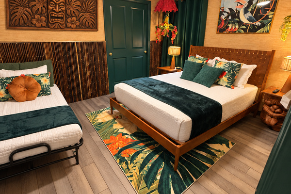 Queen bed with optional rollaway twin bed.
