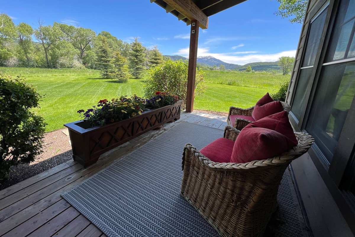 Unobstructed south facing view from the back deck with maintained yard and no neighbors