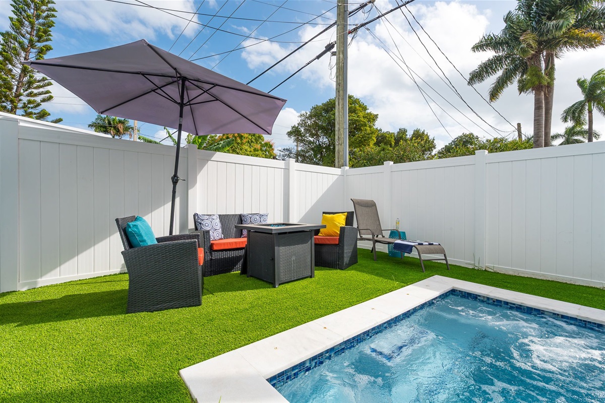 Enjoy your own private pool and hot tub, gas fire pit lounge, outdoor dining, and games—ideal for families and groups seeking a fun Florida escape.