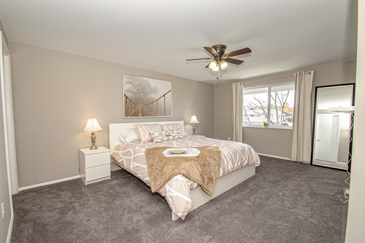 Spacious bedroom with king size bed