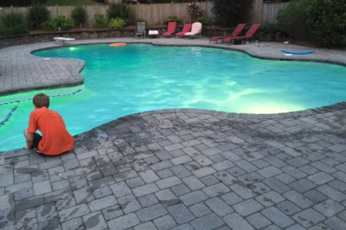 Pool view showing lights that can be turned on at night