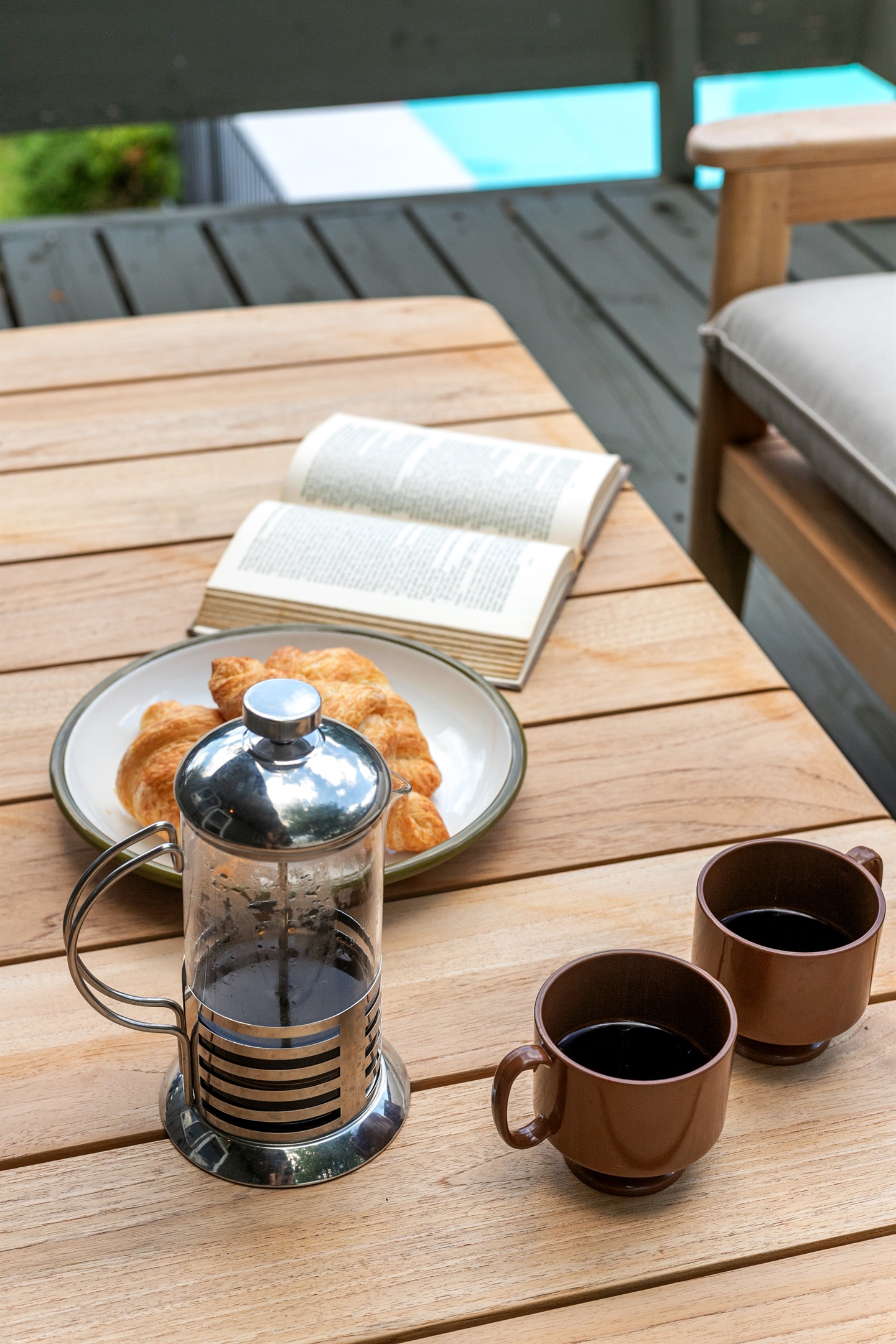 Start your day by enjoying a leisurely breakfast with a warm cup of coffee, taking in the peaceful surroundings.