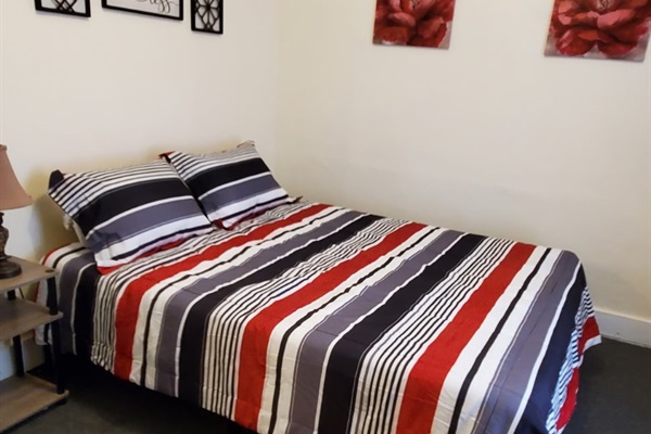 1 of 3 bedrooms all with Queen beds