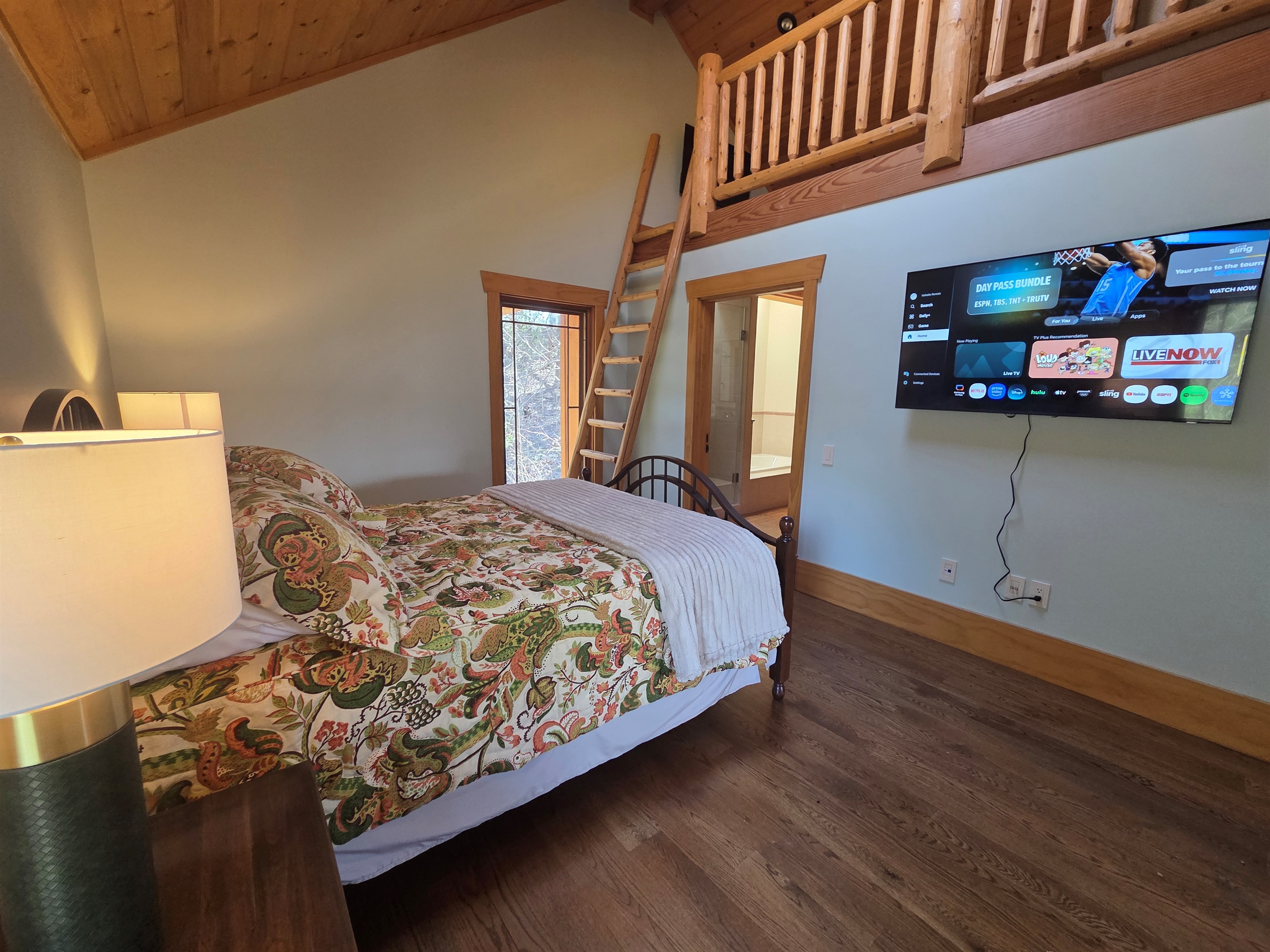 Carriage apartment bedroom with a queen bed