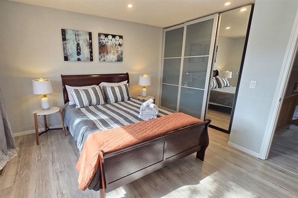 Queen bedroom with plenty of storage