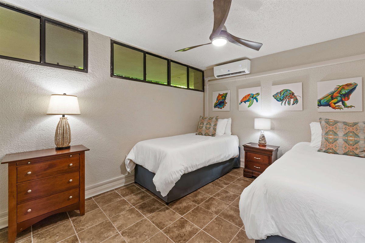 AC unit and ceiling fan to keep the room cool. Beds can be converted to a king bed or left as two twins. Please specify desired arrangement after booking.