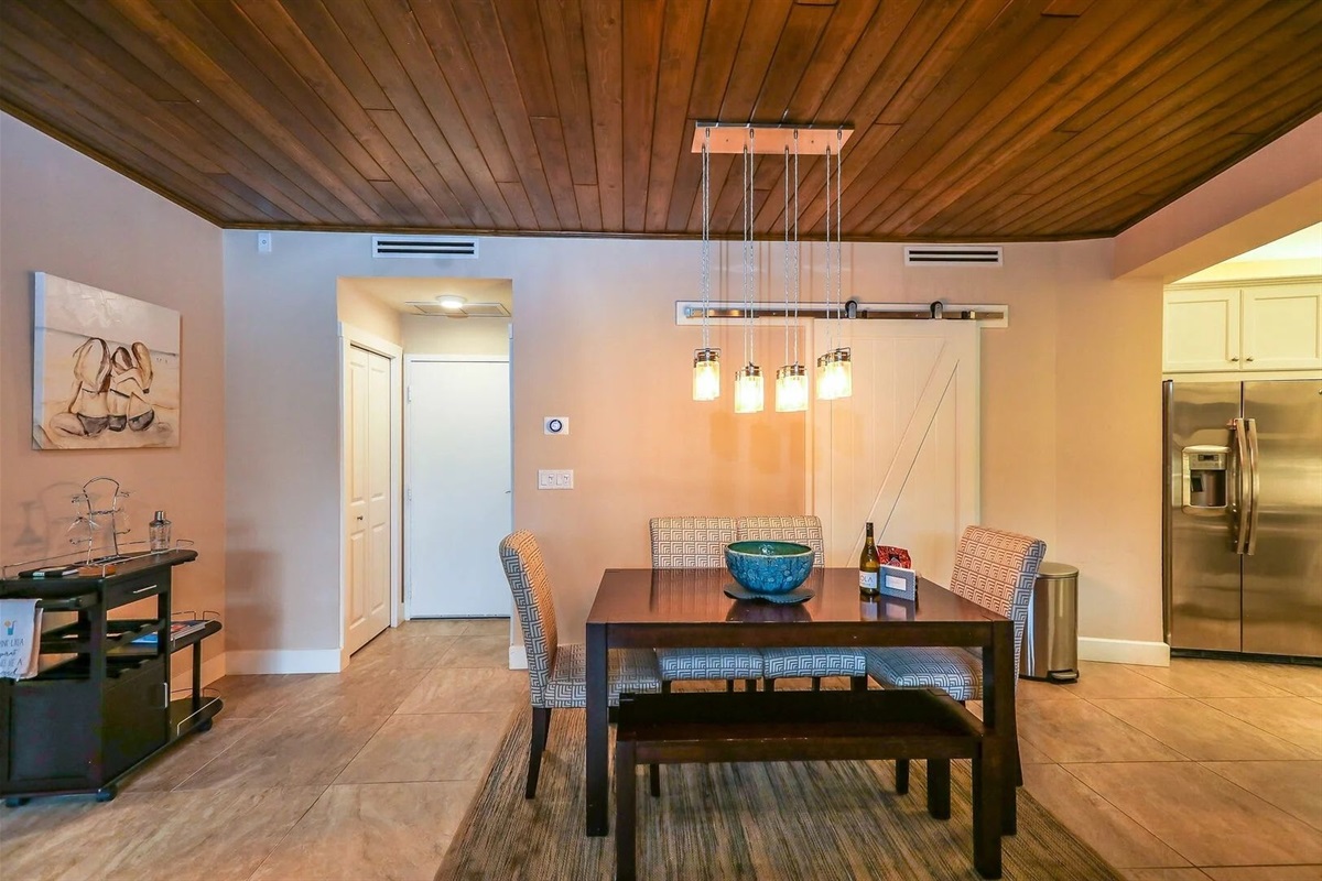 Formal dining space perfect for meals, games, or remote work.