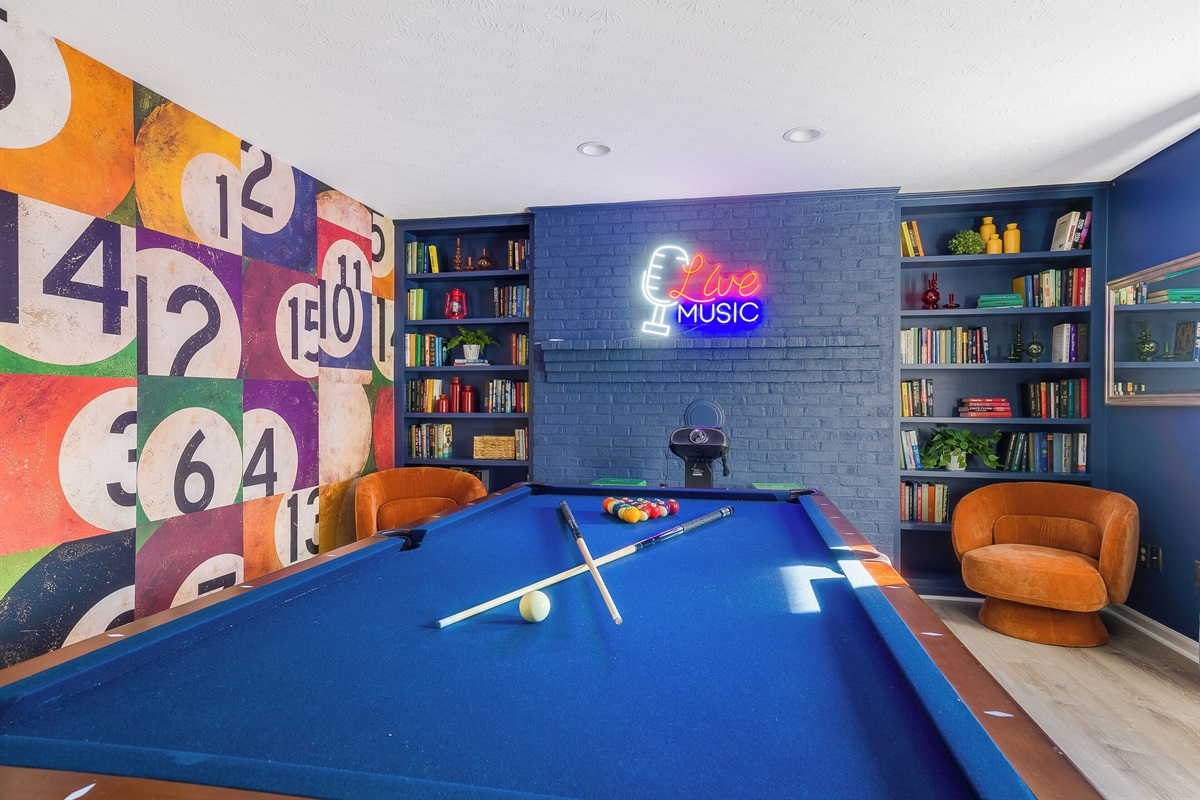 Pool table, Karaoke, books, darts, TV & bar cart