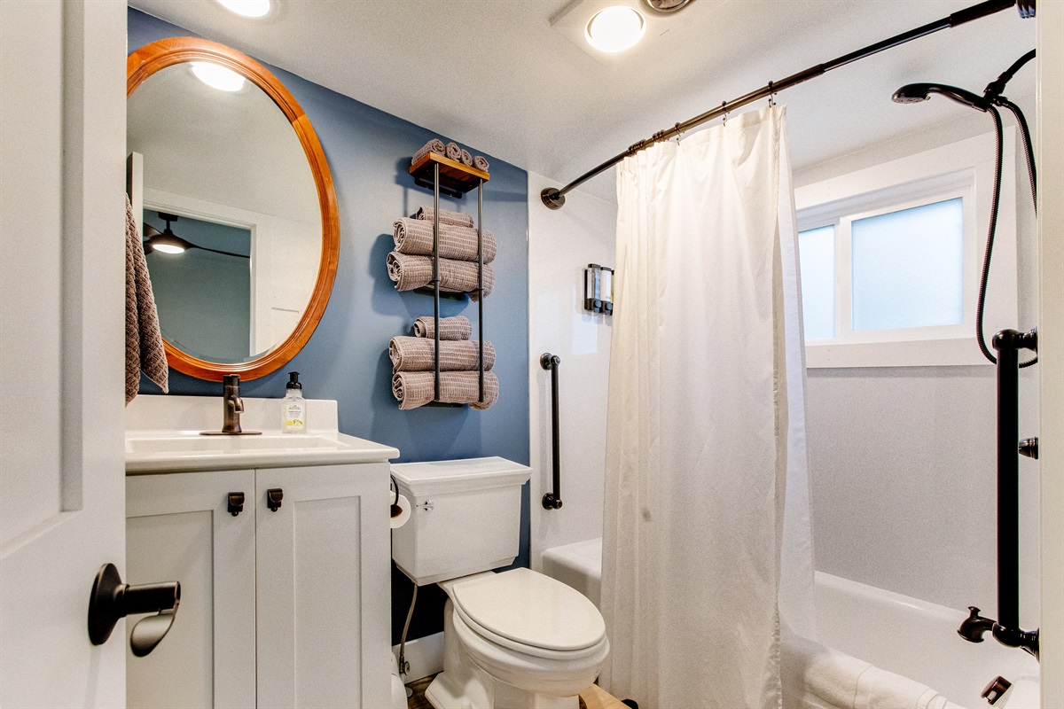 Master bathroom (includes tub/shower with removable showerhead and grab bars; heat lamp).