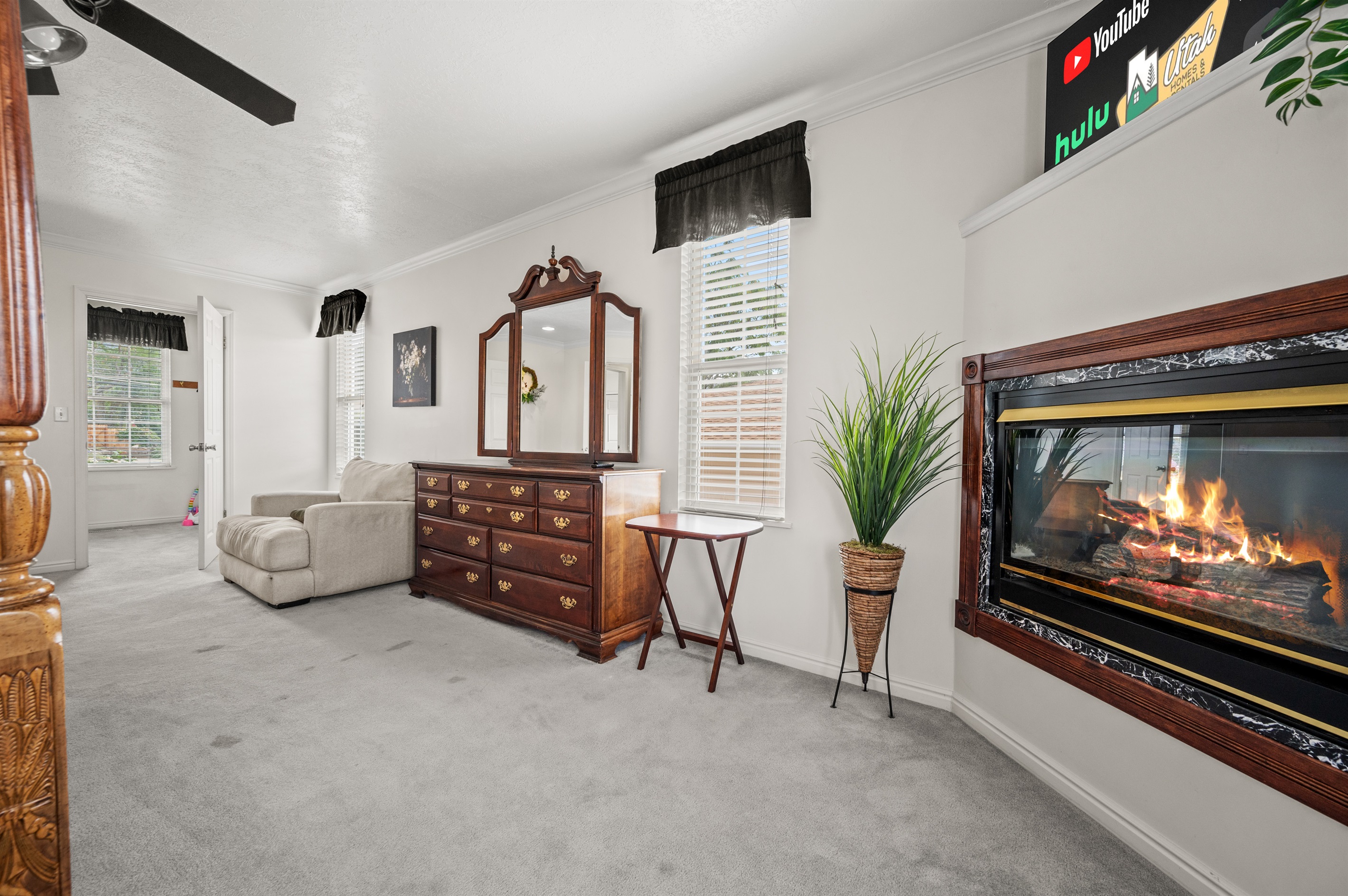 Bright and comfortable king bedroom with direct ensuite bath access.