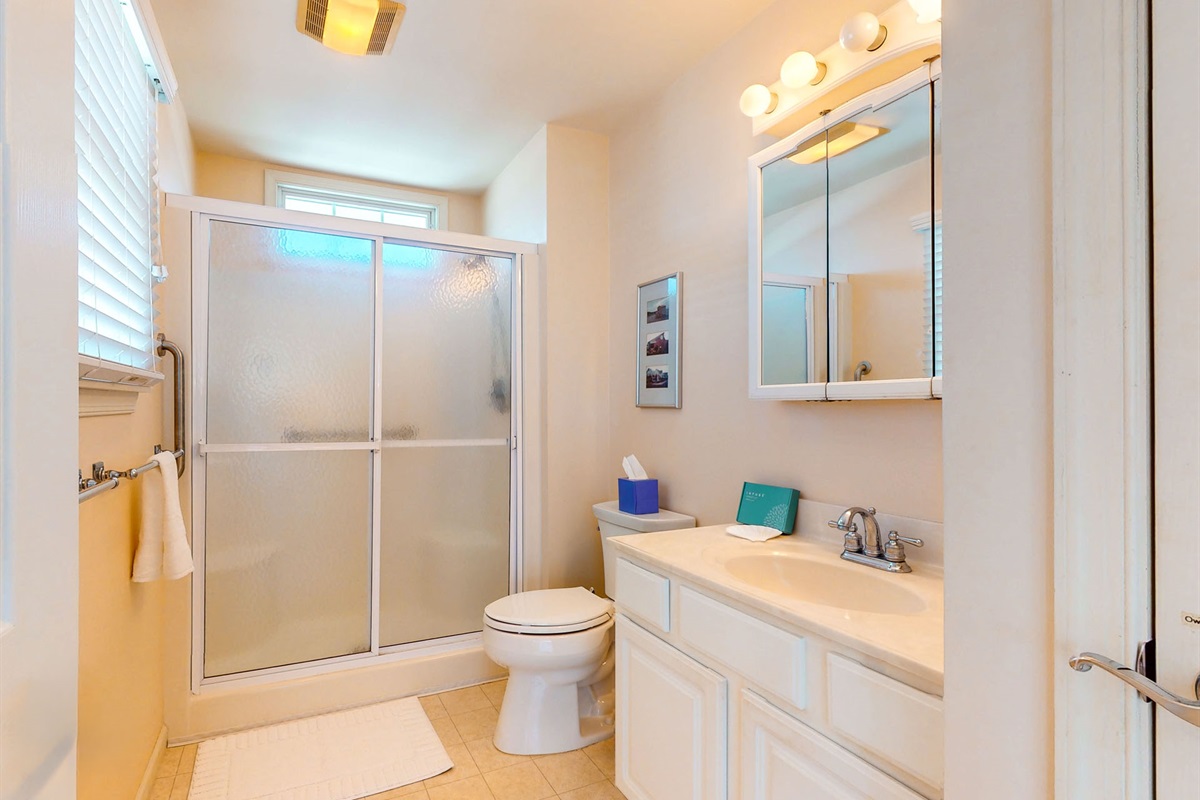 Full bathroom with a shower area 