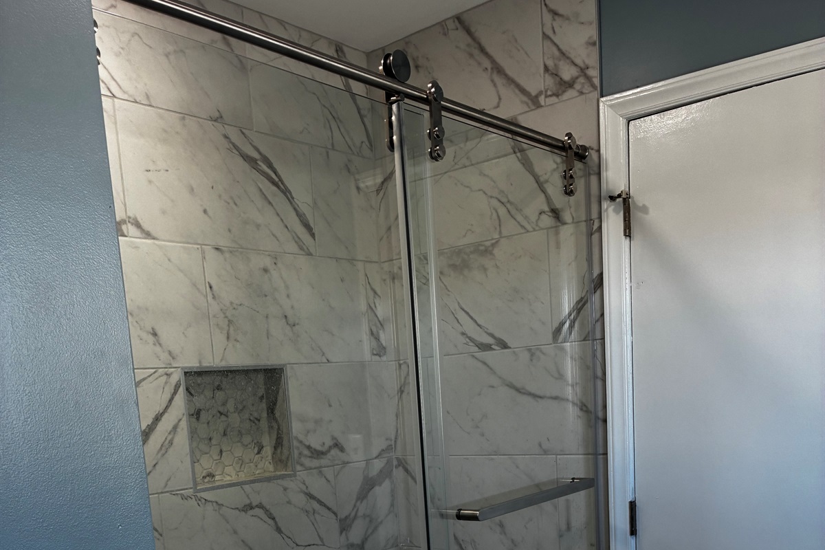 West - new tile shower Upstairs